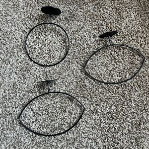 Wall mount basketball and football rack ball holder. Black